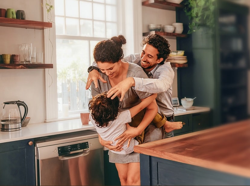 Family enjoying time together in kitchen at home