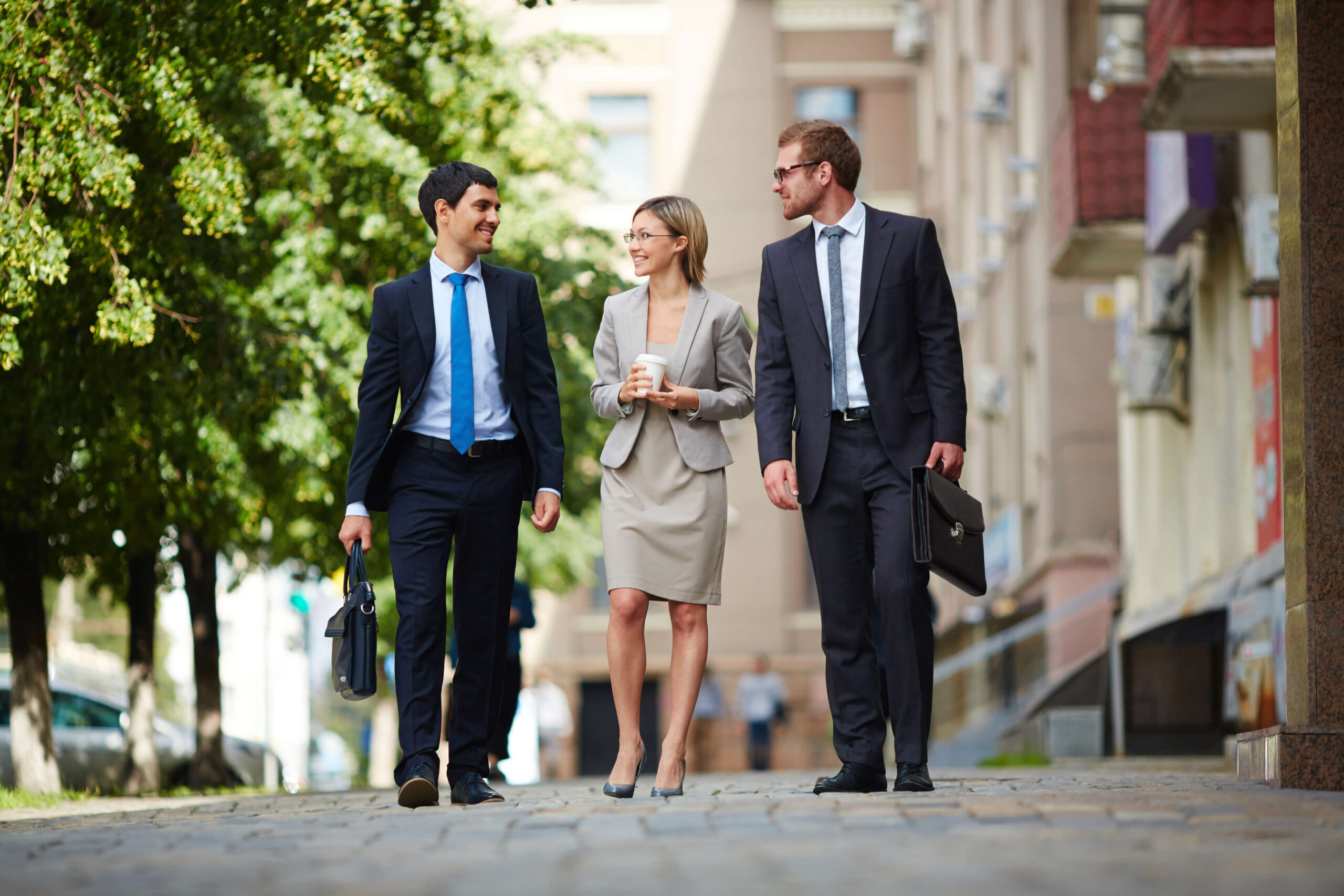 Business people walking together outdoors